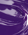 Close-up view of a highly concentrated purple liquid candle dye.