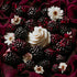 Decorative arrangement of blackberries and white flowers on a dark background