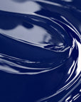 A close-up image of a blue liquid candle dye.
