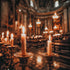 Candles in a church with a blurred background