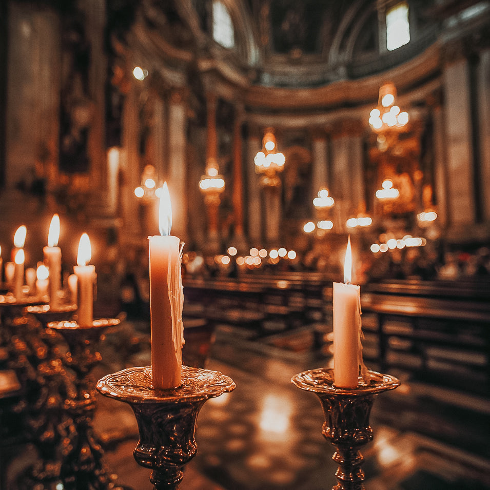 Candles in a church with a blurred background