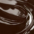 A close-up image of a chocolate brown liquid candle dye.