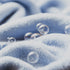 Bubbles on a soft blue blanket