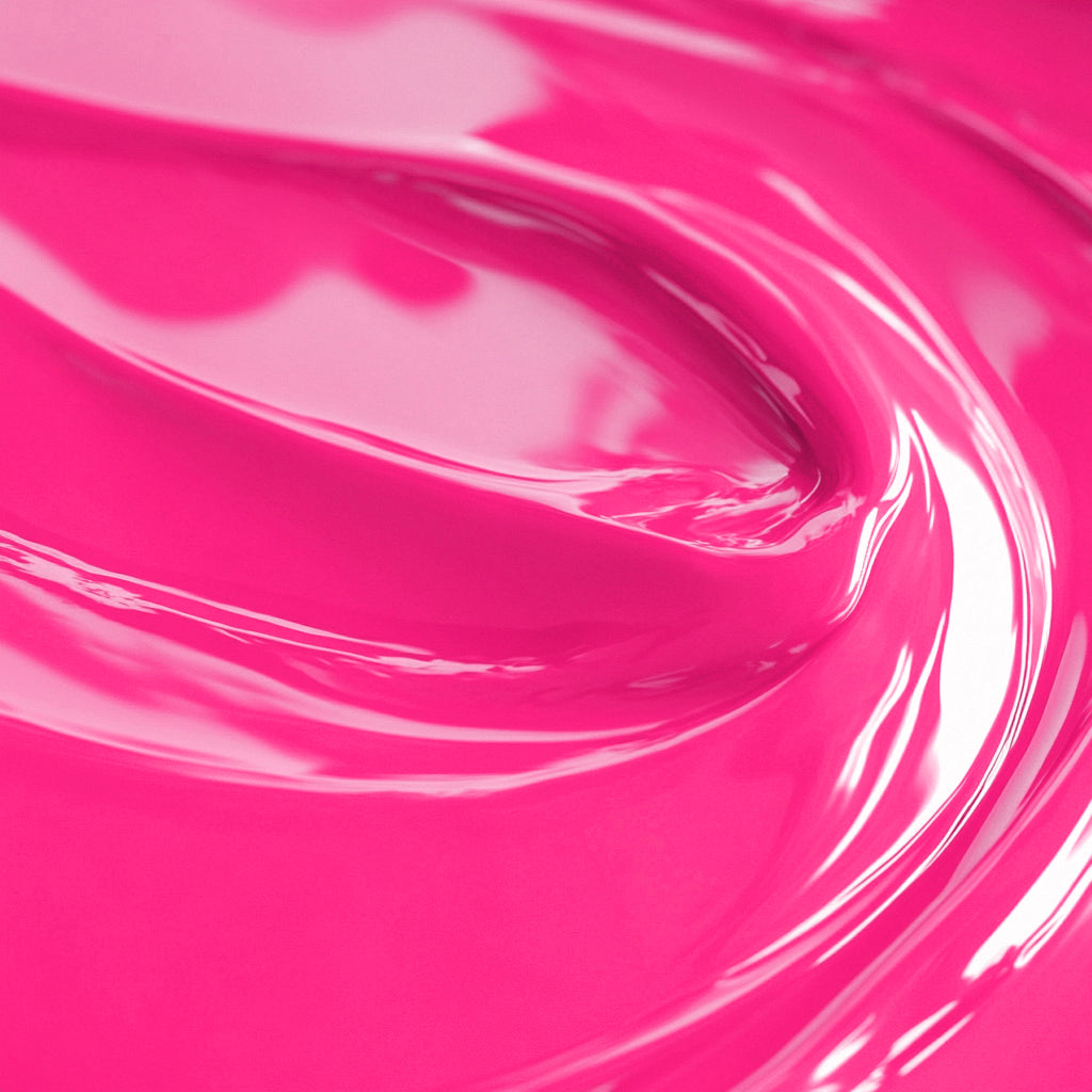 Close-up of highly concentrated pink fluorescent liquid candle dye.