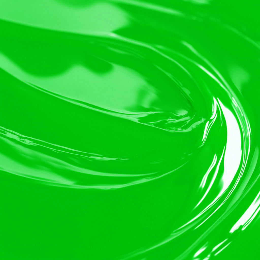 A close-up image of a highly concentrated lime green liquid candle dye.