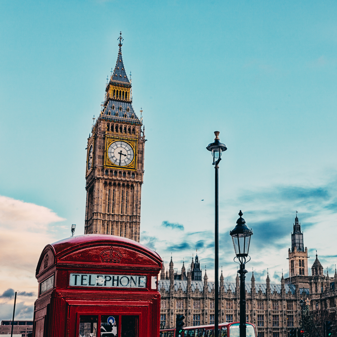 A image featuring a red telephone box and the Elizabeth Tower (Big Ben) in the background, symbolizing London.