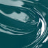 A close-up image of a teal-colored liquid candle dye.