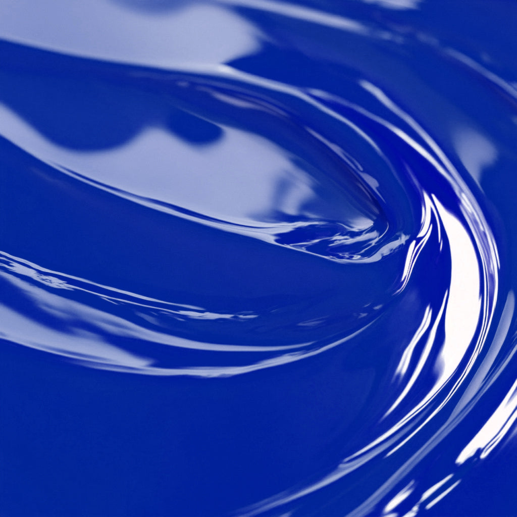 Close-up view of a highly concentrated blue liquid candle dye.