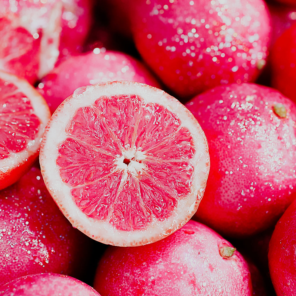 Close-up of pink yuzu showing its interior.