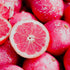 Close-up of pink yuzu showing its interior.