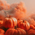Pumpkins with orange clouds i background