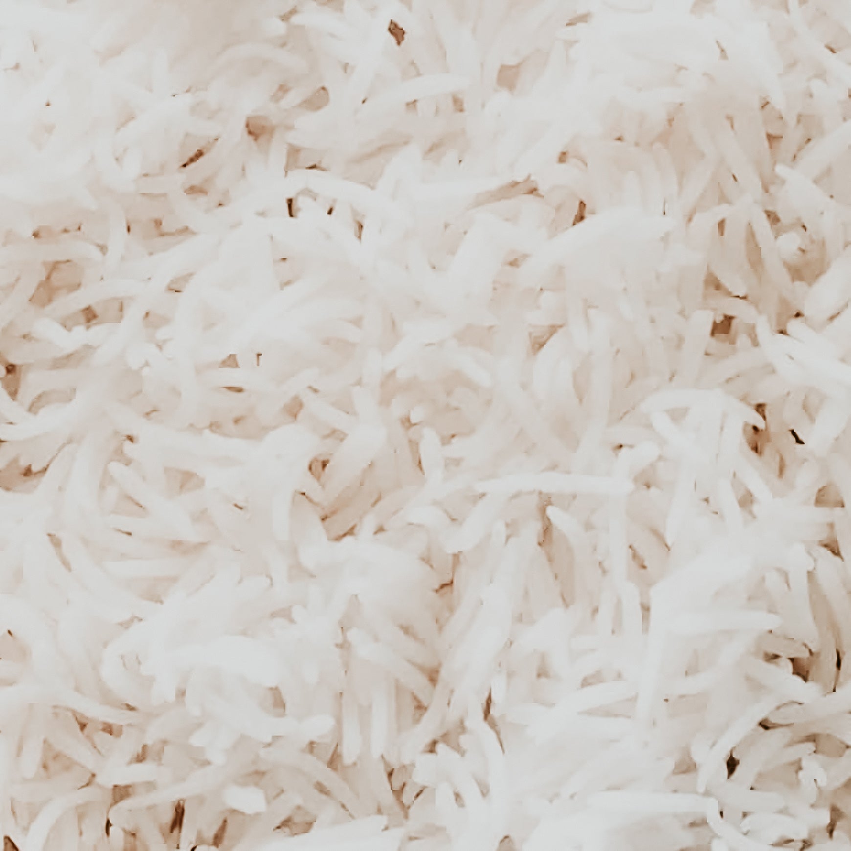A close-up image of steamed rice.
