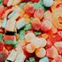 A colorful assortment of various sour gummy candies.