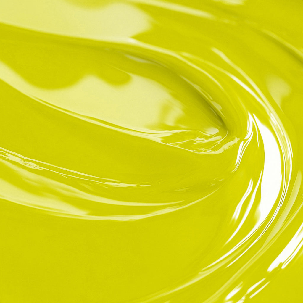 Close-up of a yellow fluorescent liquid candle dye.