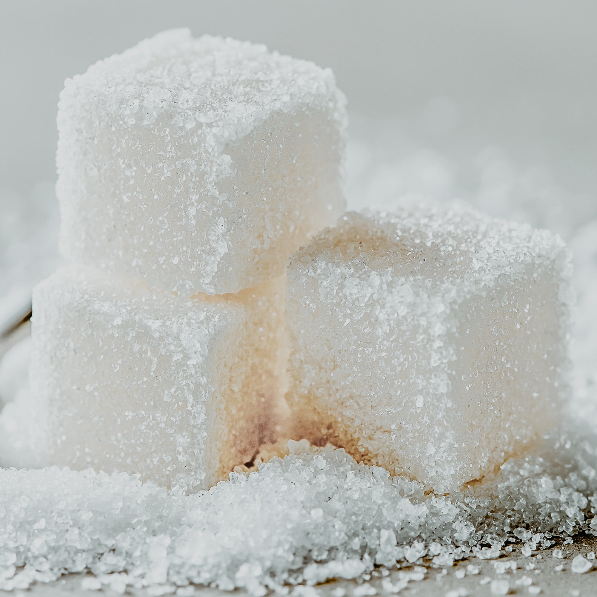 Close-up of sugar cubes with a blurred background