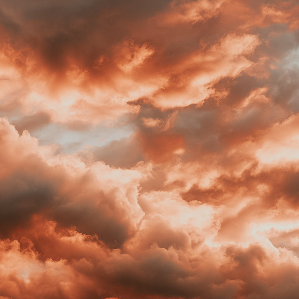 Fiery orange and red clouds in a dramatic sky