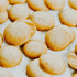 An image of vanilla wafers, small round cookies, possibly used for packaging or scent purposes.