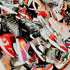A collection of various sneakers arranged in a visually appealing manner, possibly for retail display.